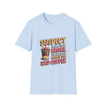 T‑Shirt — "Suspect Claims to Be Broke But Always Has Money for Iced Coffee" Funny Graphic Tee